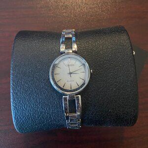 New in box women's Citezen Eco Drive Axiom Mother of Pearl bracelet watch